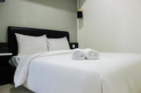 Direct Access to Pool 2BR Apartment at Parahyangan Residence By Travelio